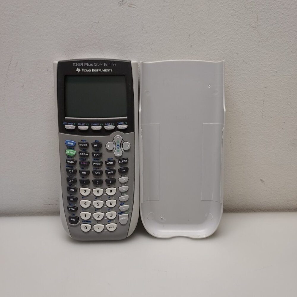 TEXAS INSTRUMENTS TI-84 PLUS SILVER EDITION GRAPHING CALCULATOR AND COVER EWC